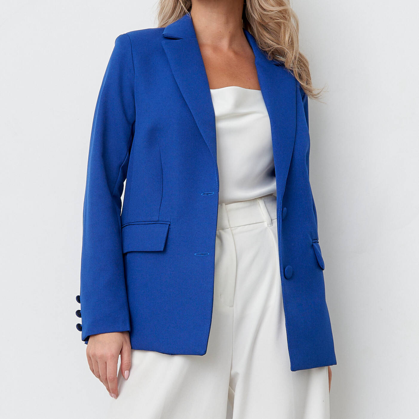 Person wearing bright blue blazer